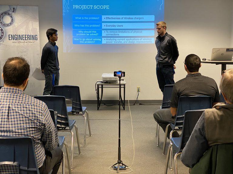 John Santiago (Port Chester, NY) and Josef Sollman (Port Angeles, WA) explain their cell phone wireless charging project
