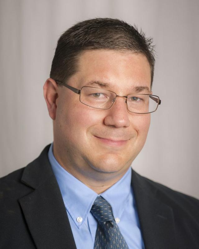 Headshot of Dr. Leroy Huizenga