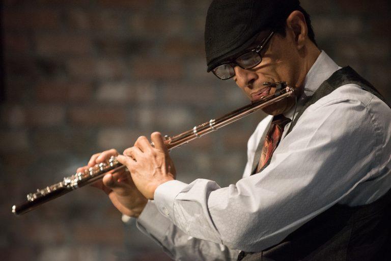 Nestor Jones playing flute 