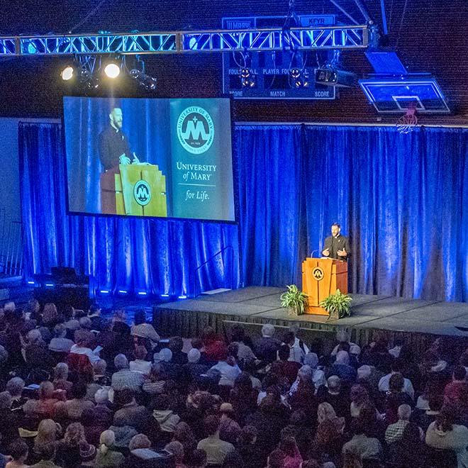 Full crowd participating in University of Mary's annual Prayer Day