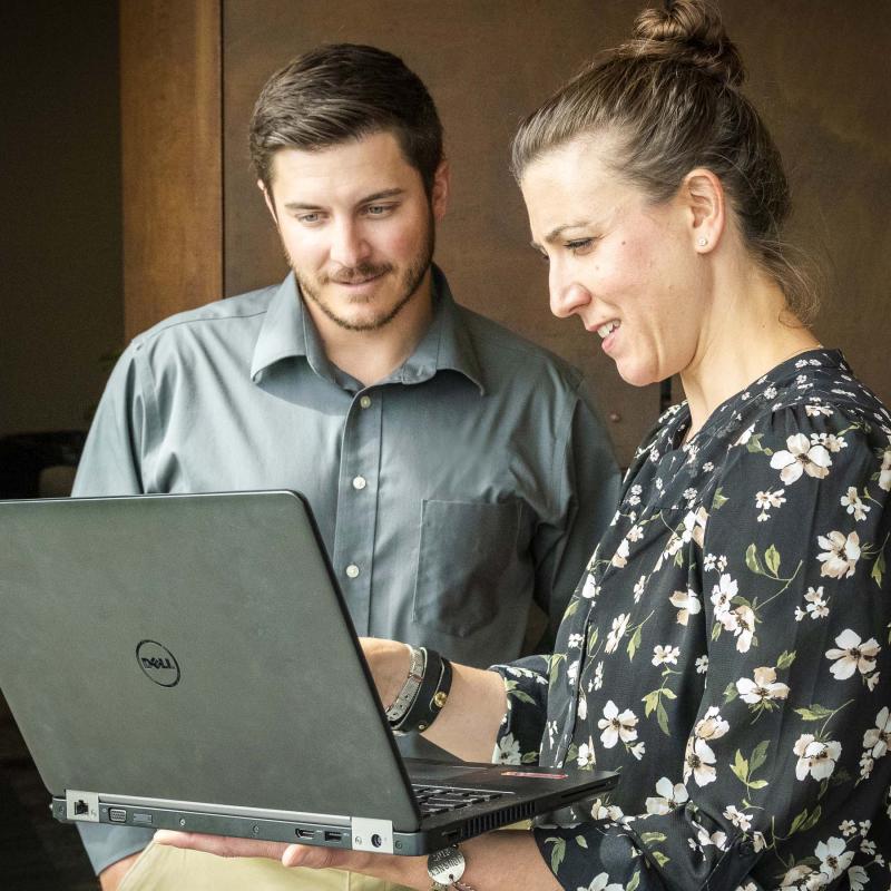 Students Reviewing Content on a Laptop