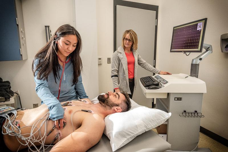 Dr. Jill Nustad with Exercise Science students at the University of Mary