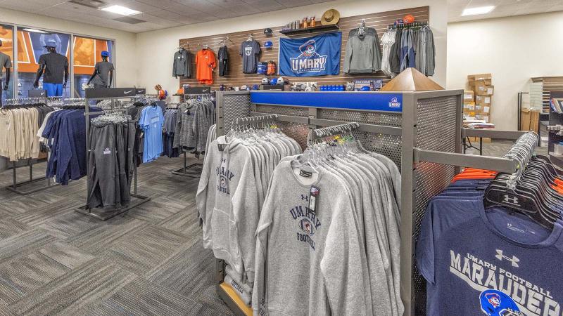 Inside of the University of Mary Bookstore showing shirts