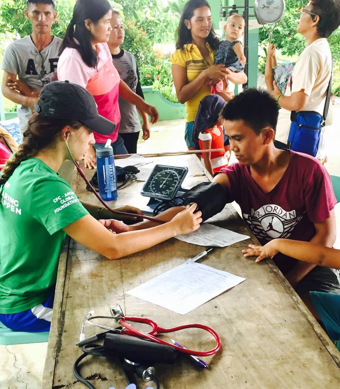 Kari Bernhardt performing medical mission work in the Philippines