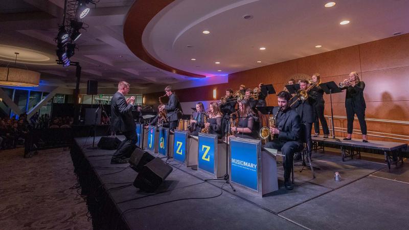 Jazz ensemble performing on stage at annual Jazz Festival
