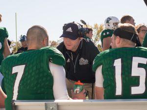 ​​​​​​​Craig Bagnell coaching his players on the bench at Bemidji State