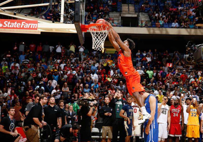 Devan Douglas Dunking a Basket