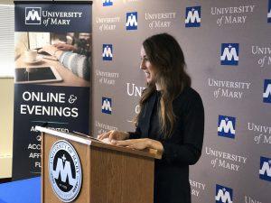 Katie Rosenfeldt, an occupational therapy graduate student at the University of Mary and native of Moorhead, MN, talks at press conference