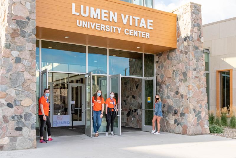 Students in front of the Lumen Vitae Center
