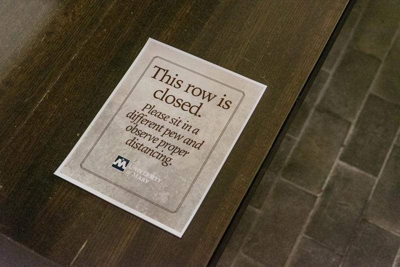 Sign for Pew Row Closed