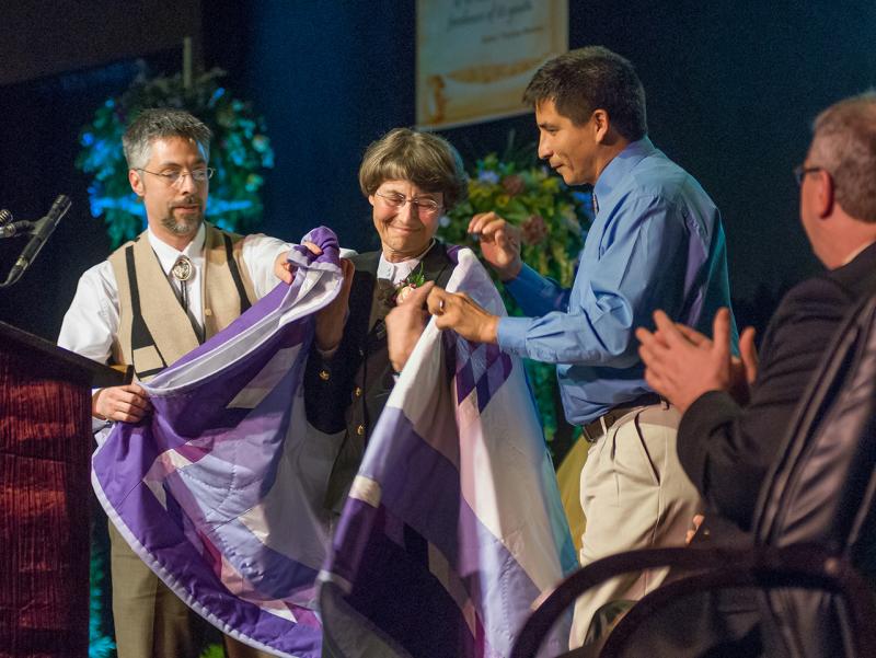 Sr Thomas receives an Native American Quilt