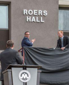 ​​​​​​​Monsignor James Shea, president of the University of Mary, looks on as the name of the new all-female residence hall on campus is revealed.