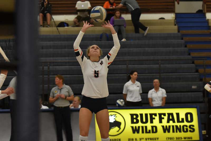 Volleyball Player during a game with the ball