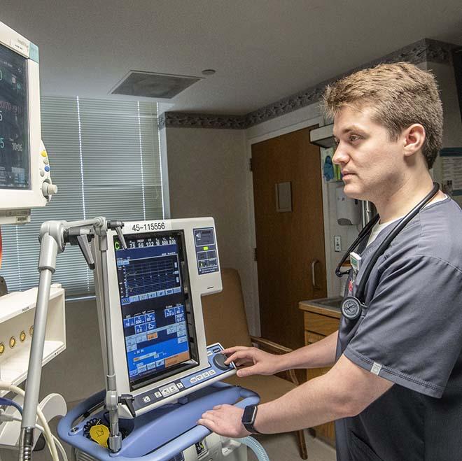 Student at st alexis working at a computer