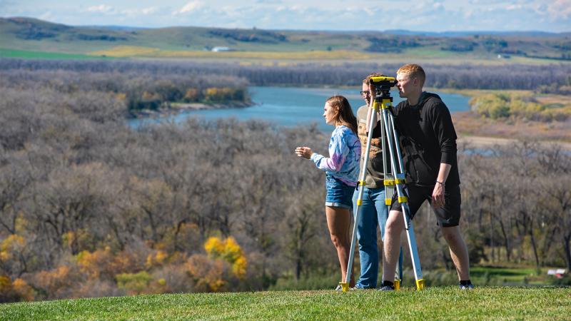 Engineering students doing survey work along the Bluff