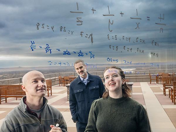 students working on a math problem 