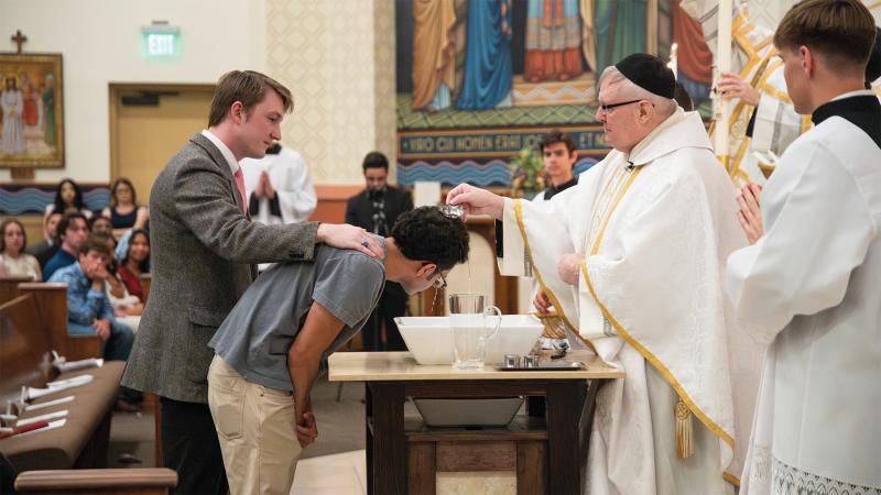 University of Mary and ASU alumnus Ben Power (left) oversees the OCIA program for ASU’s Newman Center and has sponsored several students entering the Catholic Church this year.
