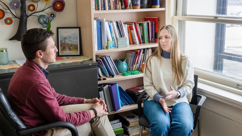 Counselor working with a patient.