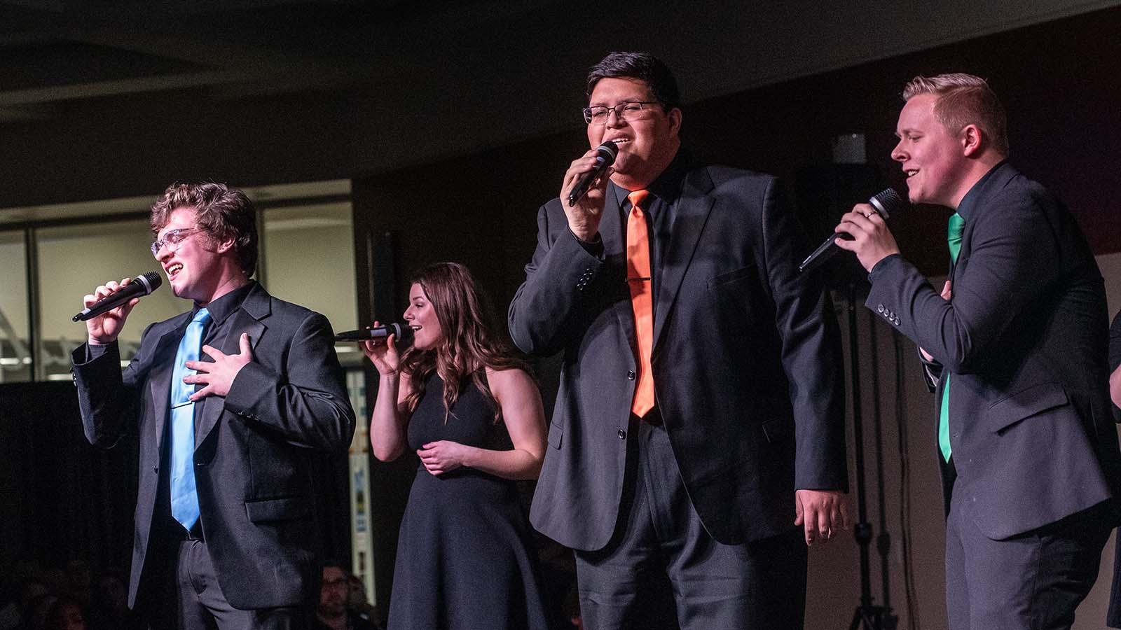 Vocal jazz ensemble performing on stage at annual Jazz Festival