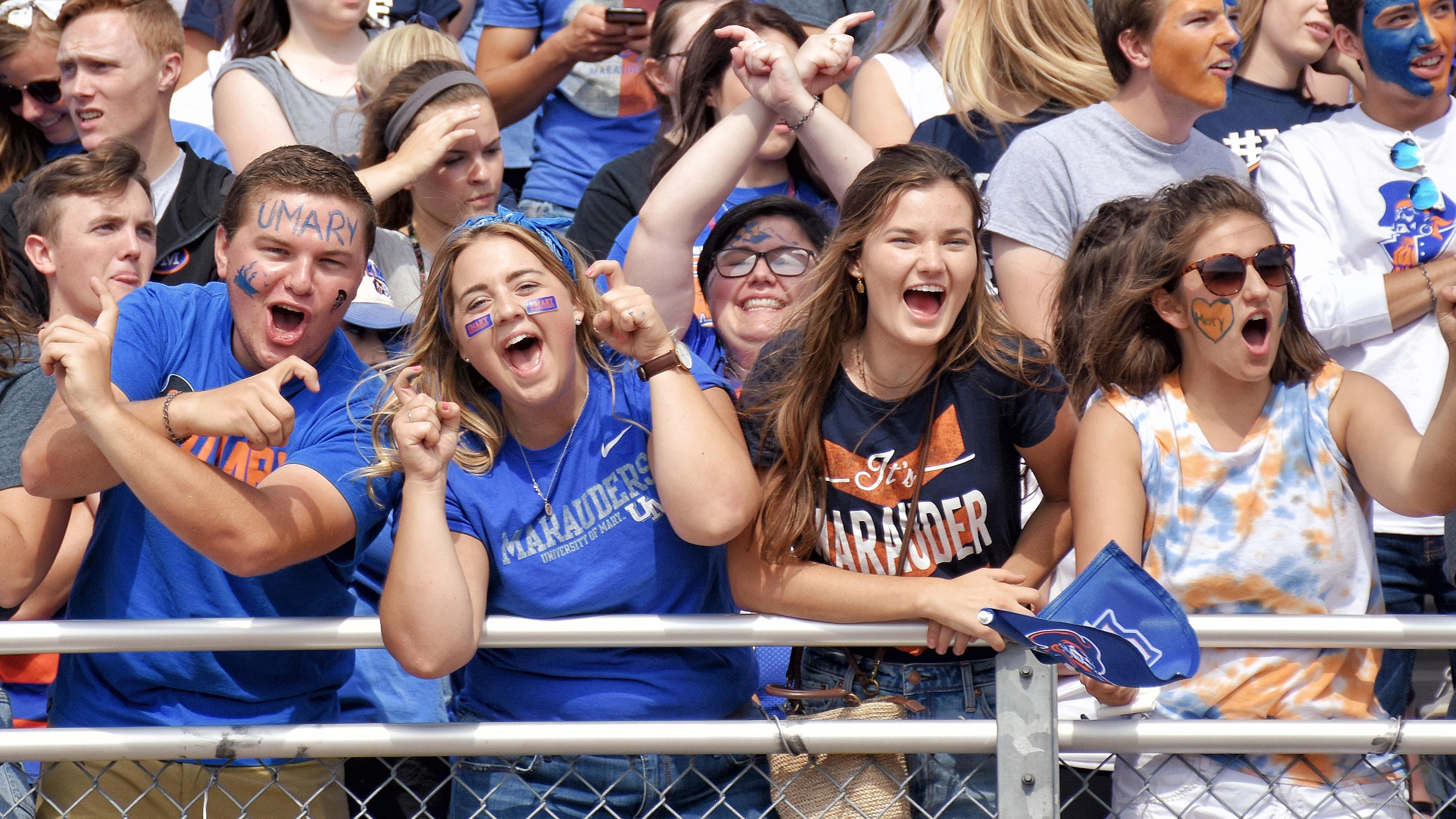 Crowd of University of Mary students cheering on the athletic teams.