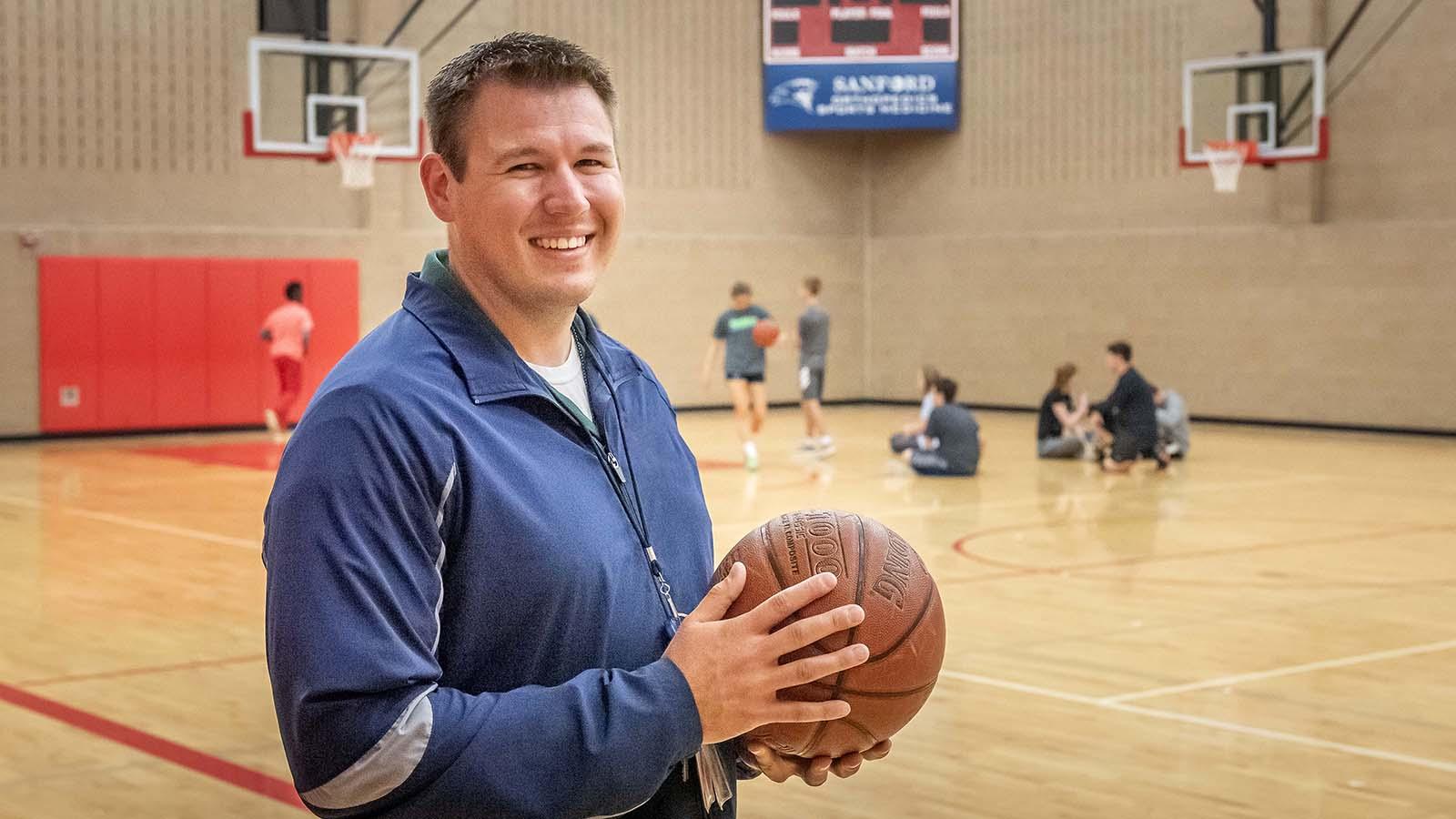 High school coach in basketball practice