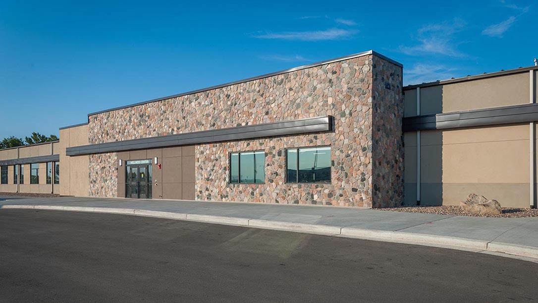 Exterior photo of the fieldhouse on the University of Mary campus.