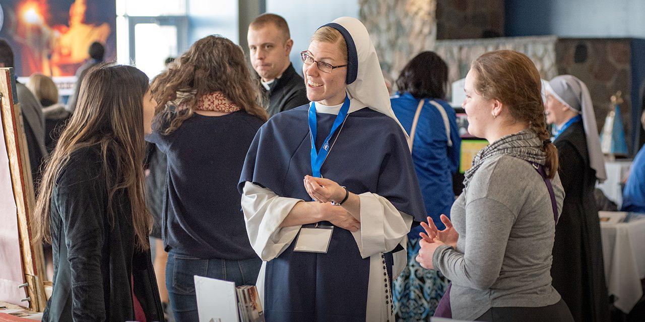 Speakers and students speaking at a vocation expo