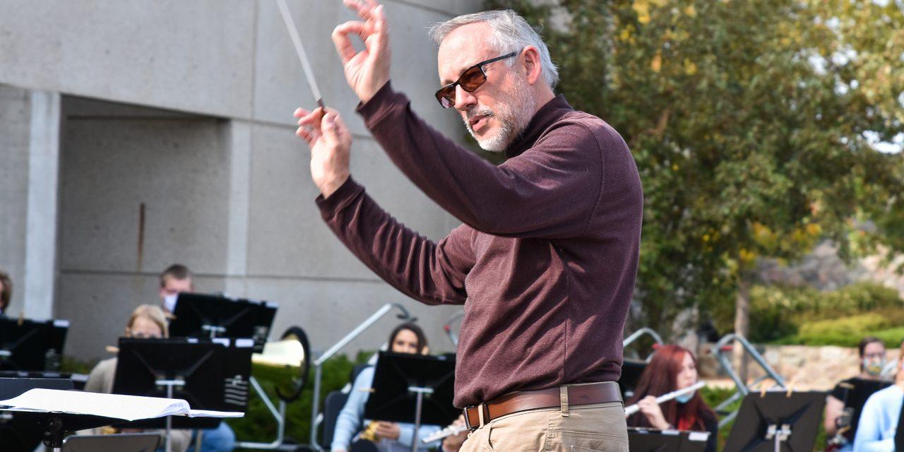 Conductor leading the band