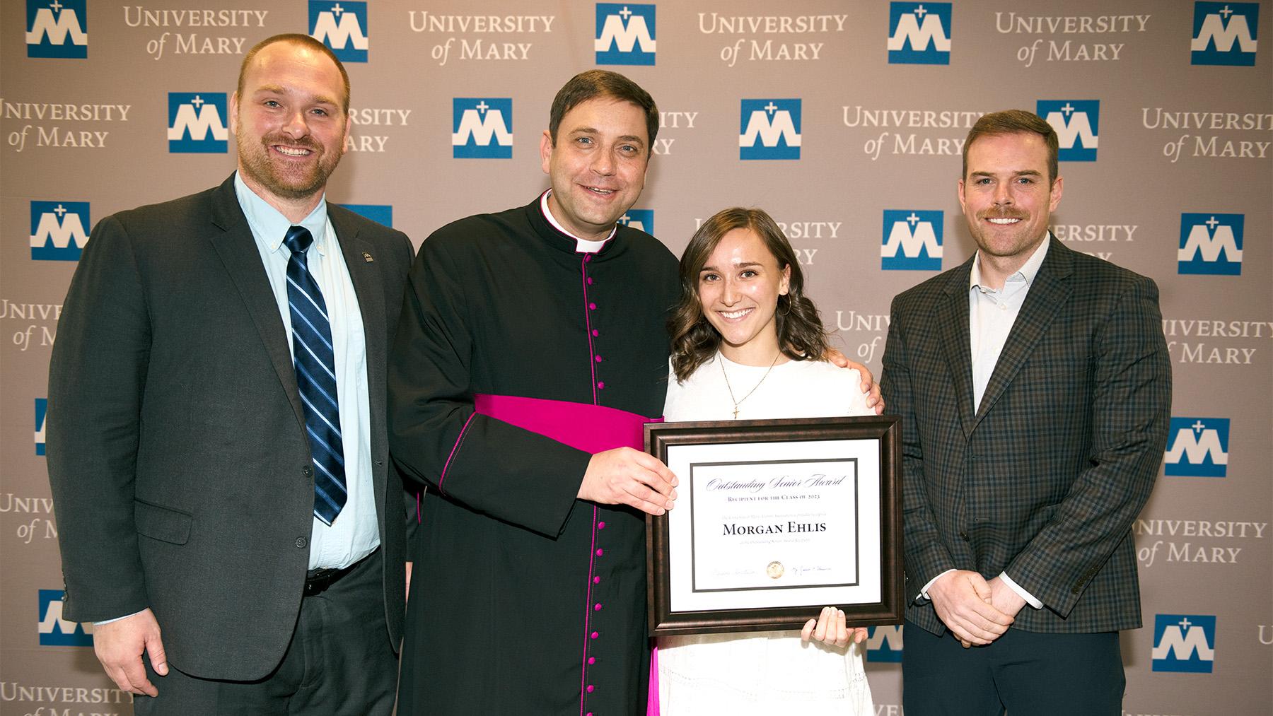 Morgan Ehlis with her outstanding senior award