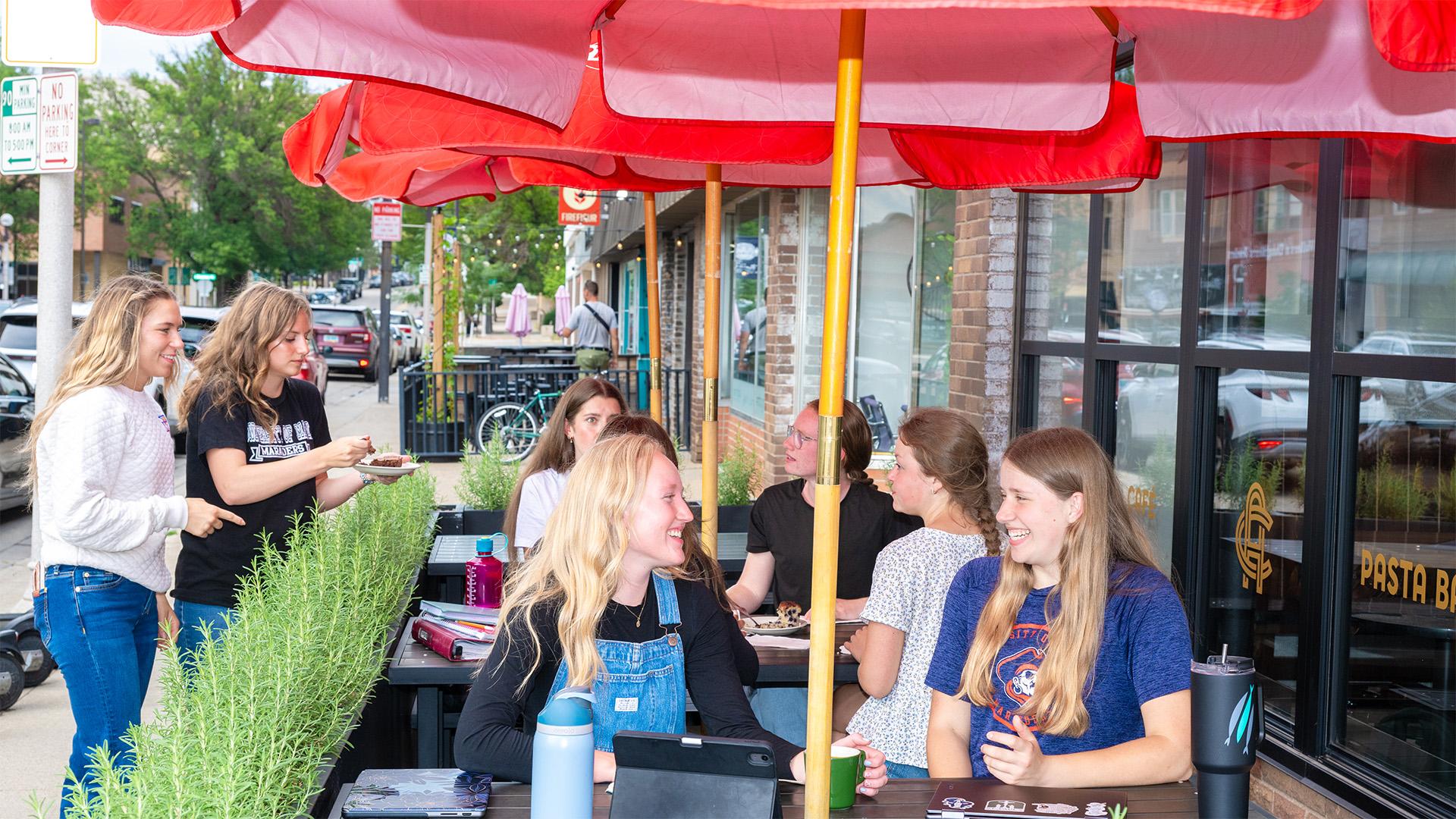 students downtown at a coffee shop