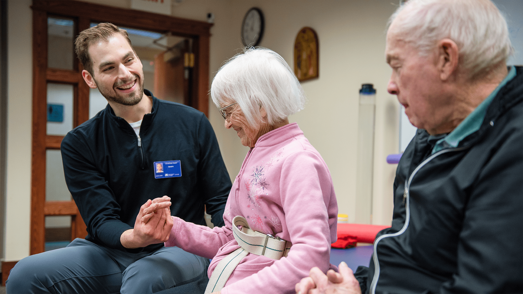 Students working with an OT patient at the Fargo Location.