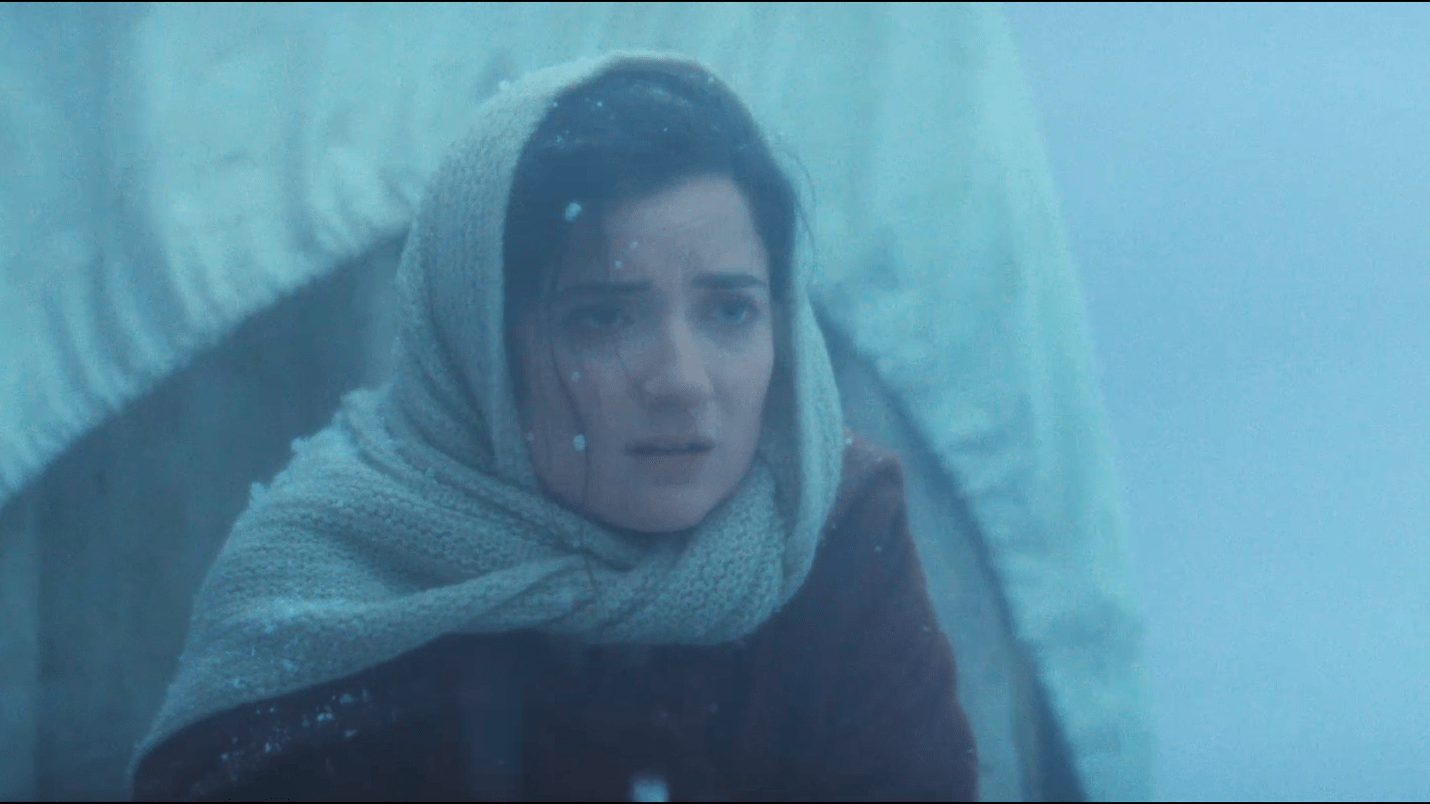 Clip from the Movie Hazel young girl riding through a snowstorm on a covered wagon