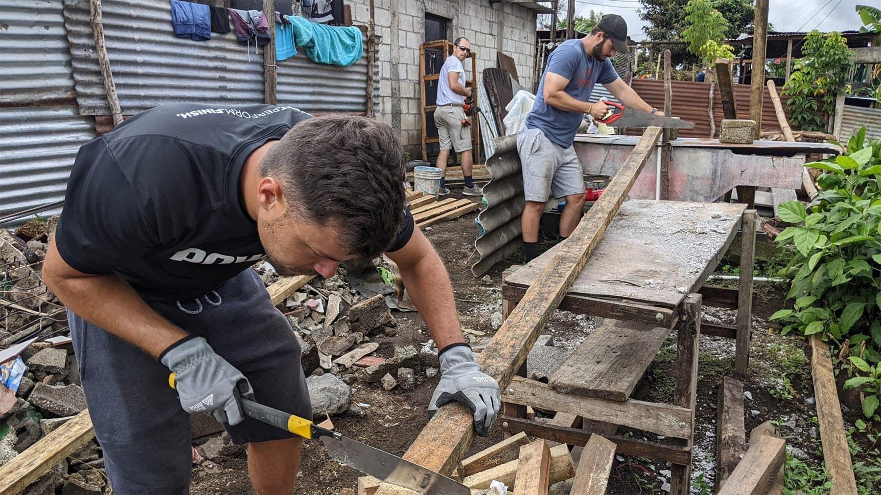 students working outside on a service trip to guatemala