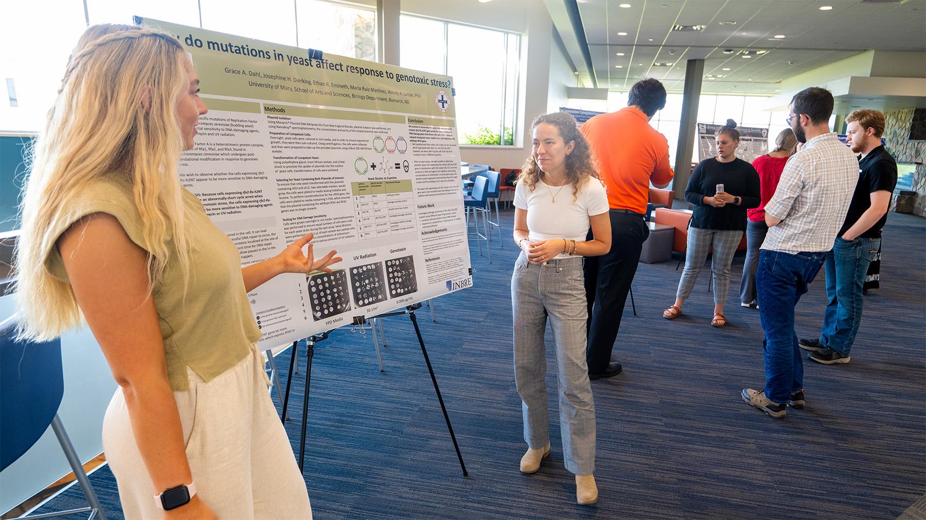 Student making a presentation on a project they worked on.