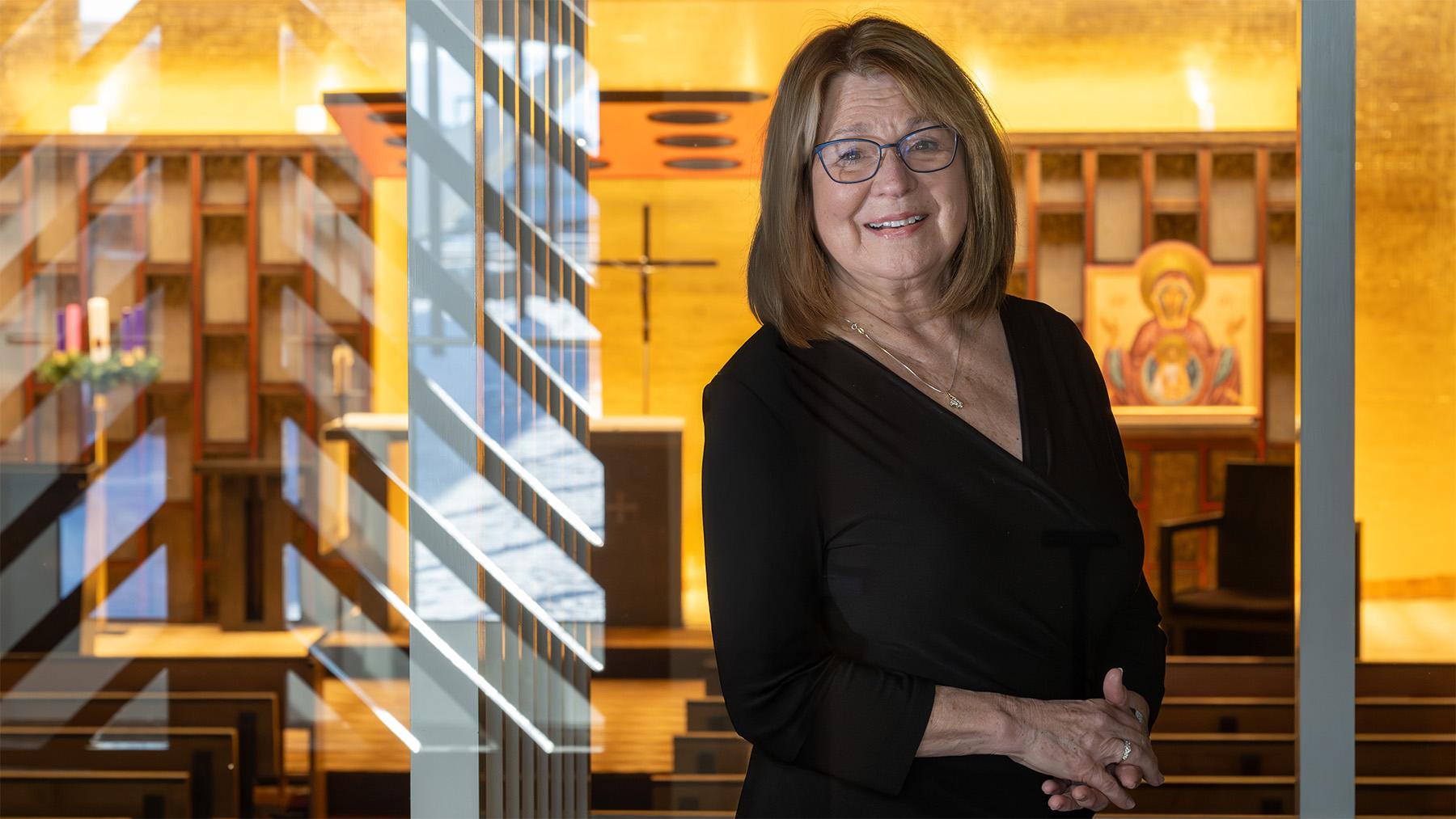 Diane Fladeland Landscape shot with Our Lady of the Word in the Background.