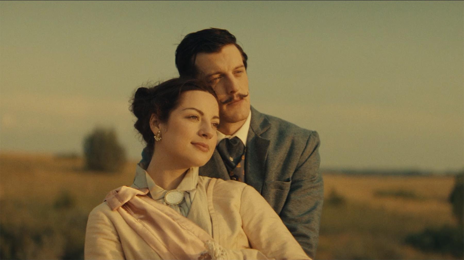 Medora and her husband looking out into the sunset