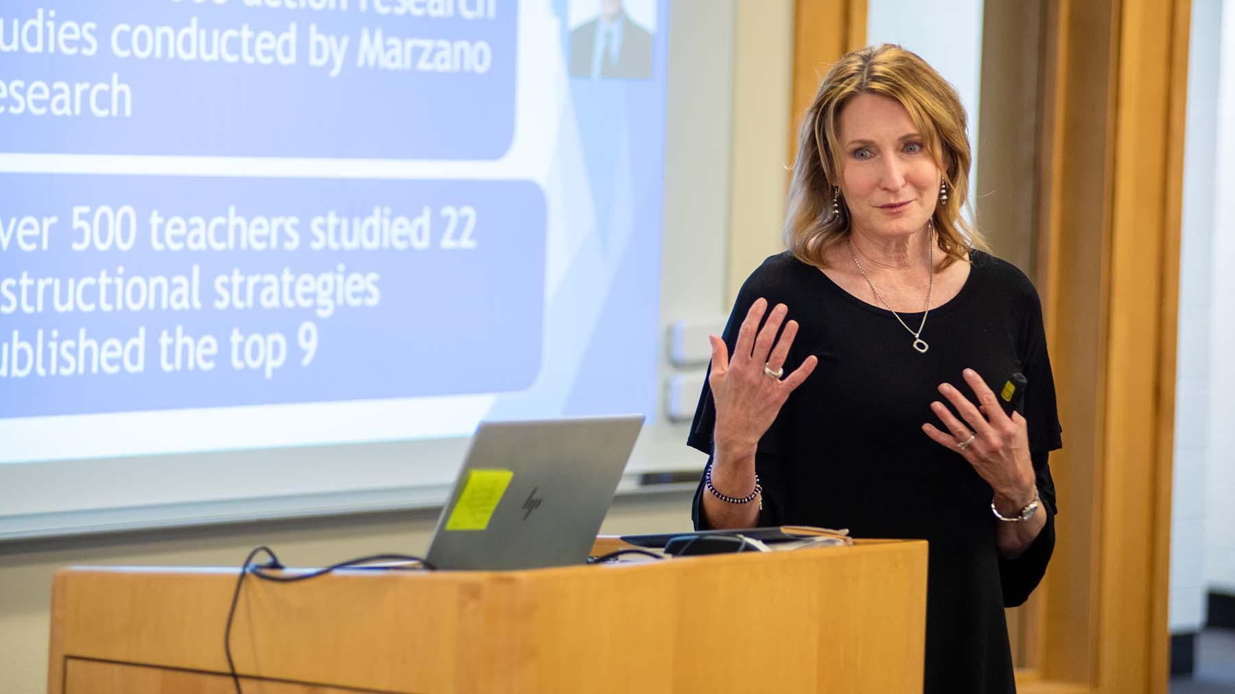 Brenda Tufte teaching a class of graduate education students